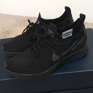 Black mesh Nike running sneaker